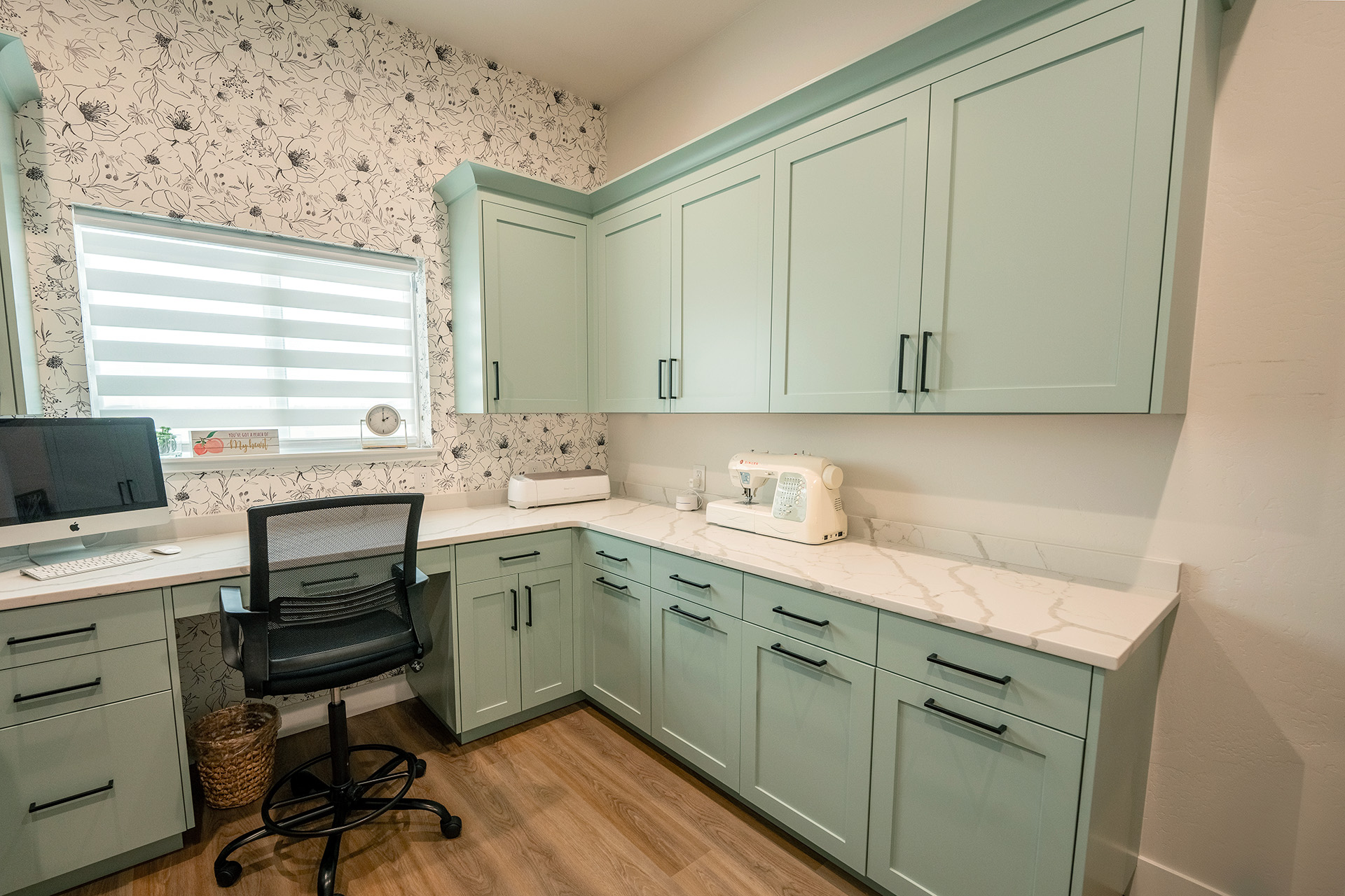 Cozy, mint-green sewing and hobby room