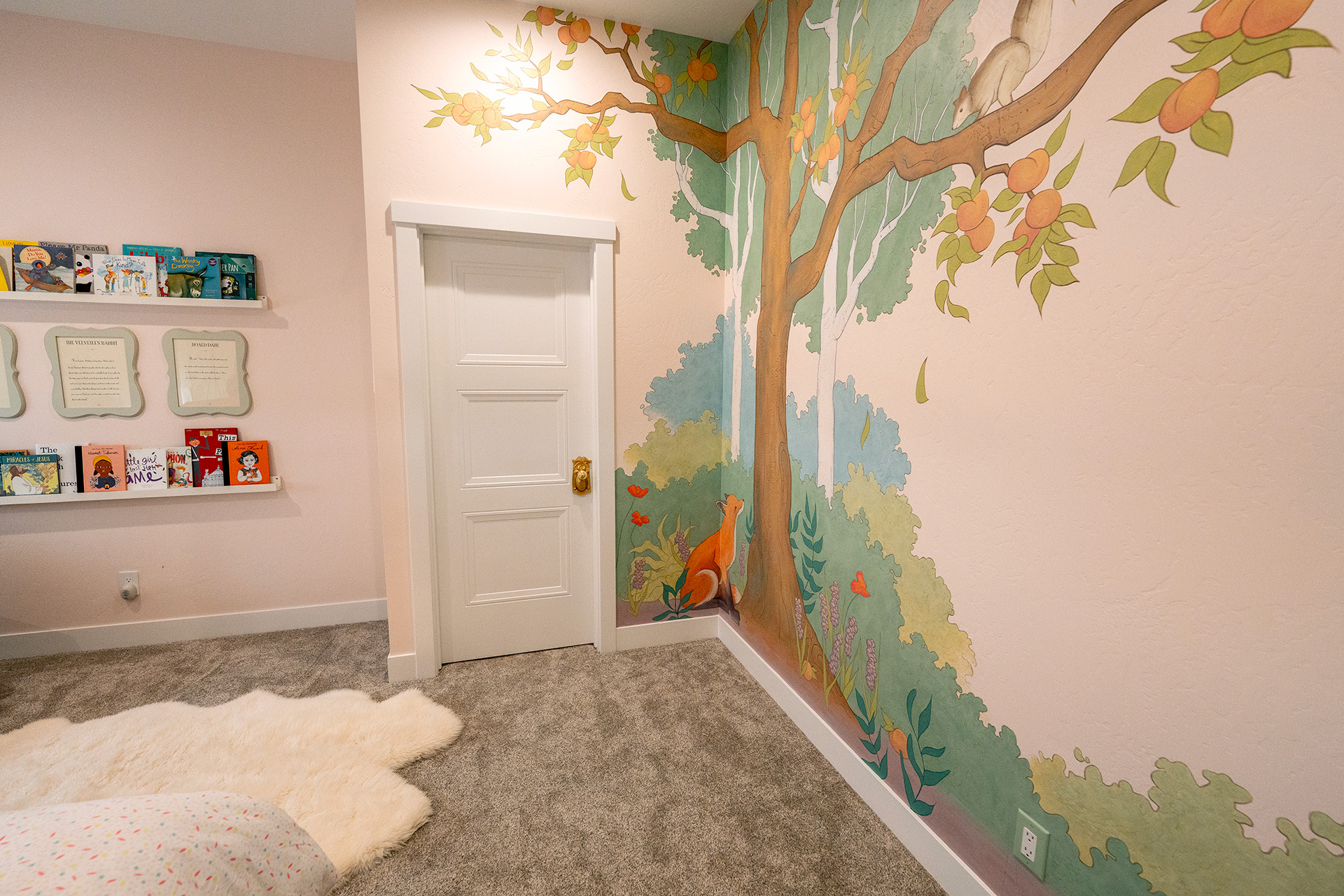 Little girls bedroom with beautiful mural